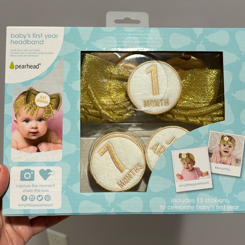 Baby’s first year head band in gold.